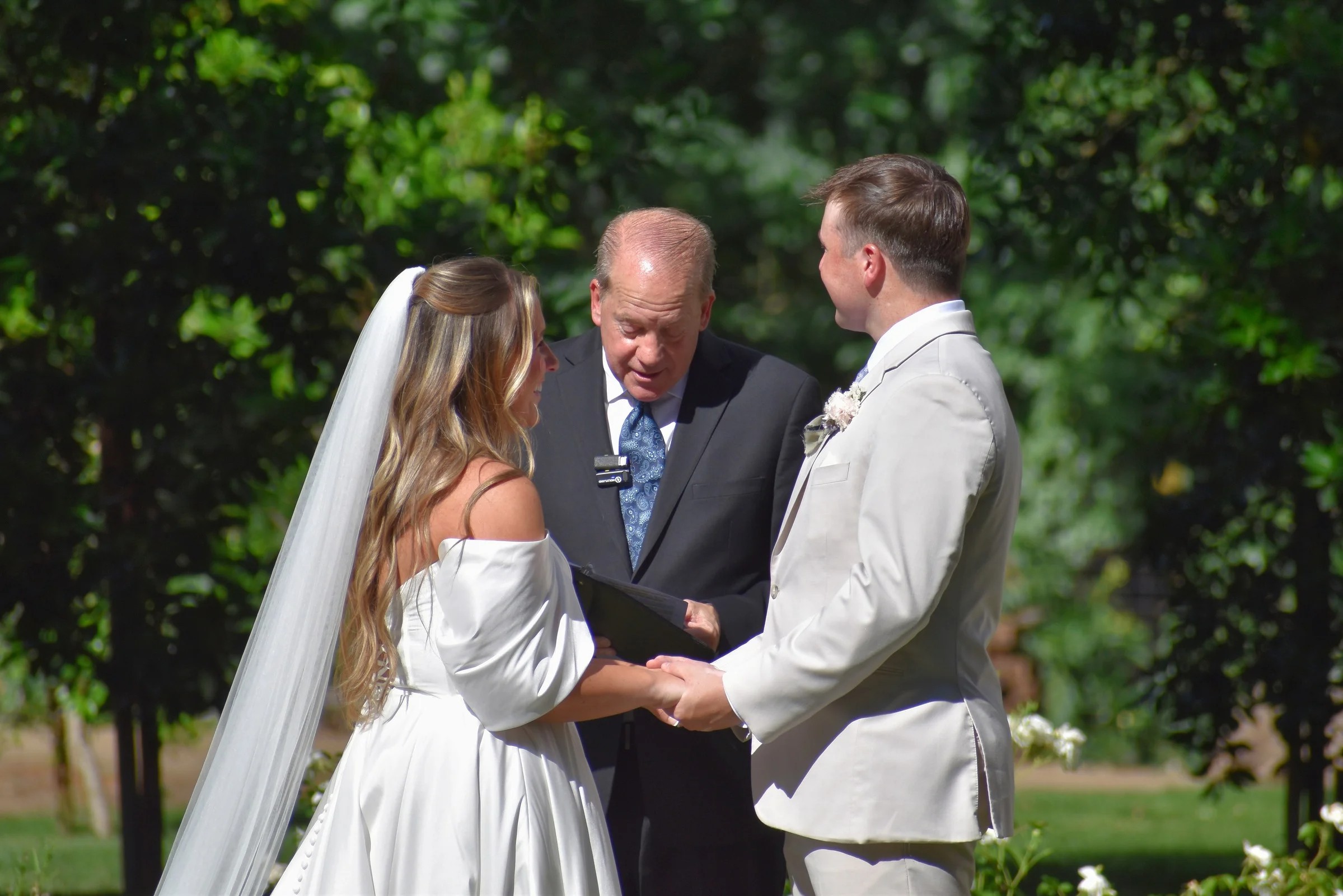 Wedding ceremony at the altar with bride groom and officiant